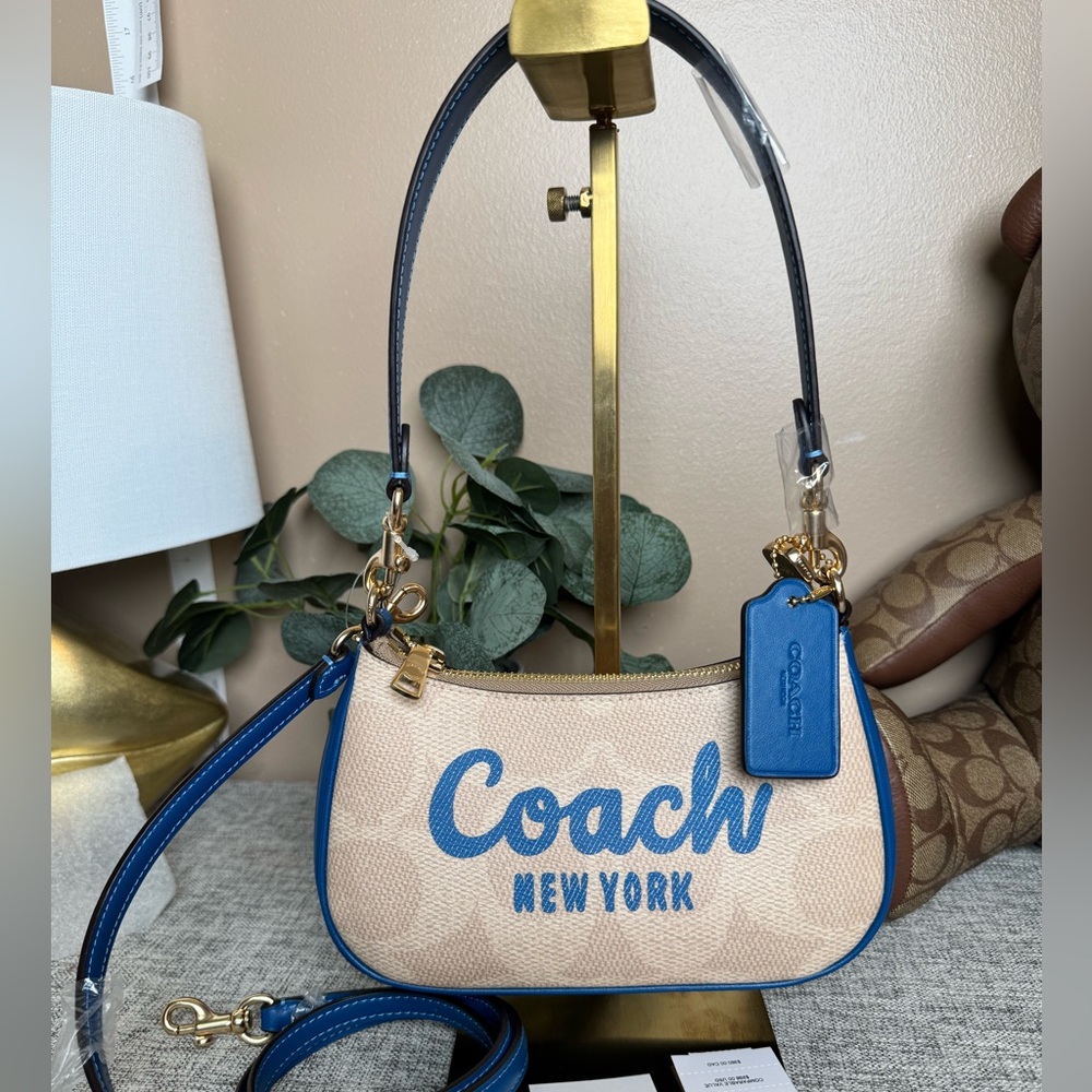 Teri Mini Crossbody Bag In Signature Canvas.Blue and Tan Shoulder Bag